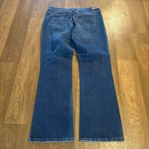 Vintage Y2K Boho Style Women's Levi's 515 Dark Wash Bootcut Flared Jeans 12w